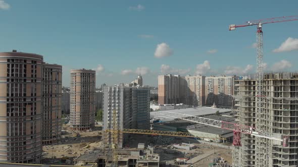 Flight Overlooking Modern Construction alt