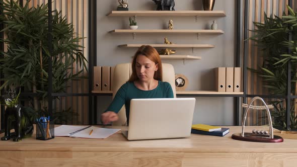 Business Woman Entrepreneur Typing on Laptop Doing Research 