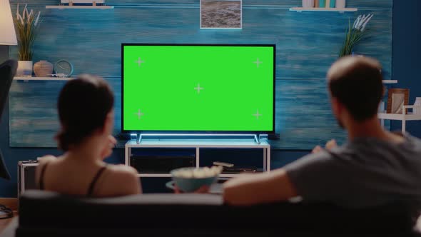 Caucasian People Enjoying Green Screen Layout on Tv