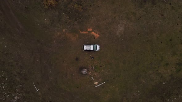 SUV parked at the bottom of a valley isolated in the Stemwinder Provincial Park in British Columbia,