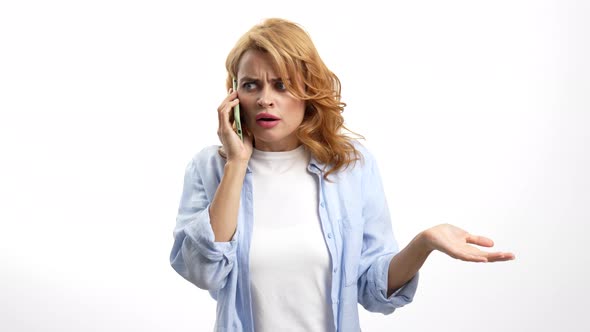 Confused Upset Woman Having Argue While Talking on Phone Negative Emotions