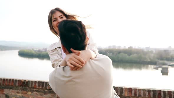 Couple in Love Hugging and Kissing Outdoor