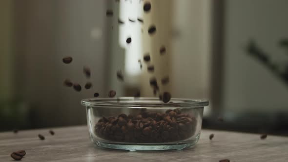 Coffee Beans Falling Into a Glass Plate in Extreme Slow Motion 150Fps