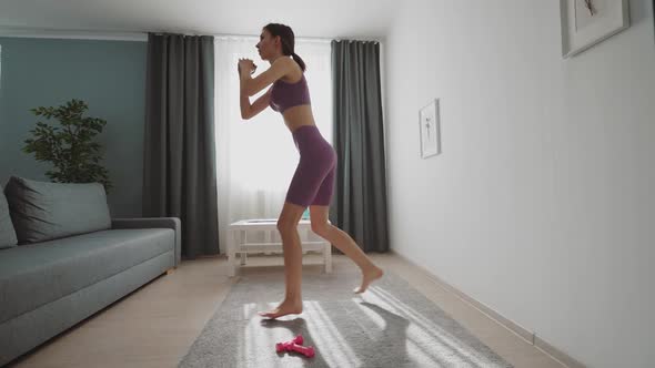 Woman Doing Squats Exercises