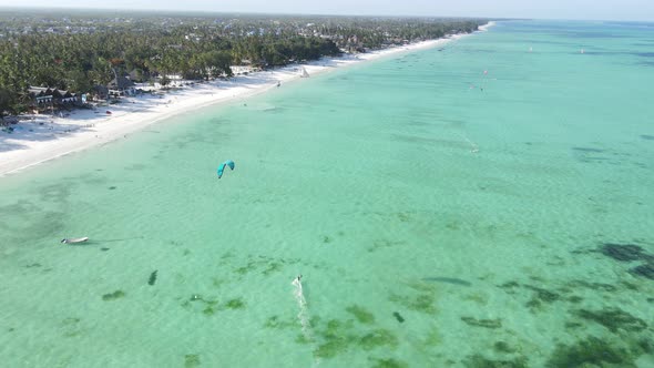 Kitesurfing Near the Shore of Zanzibar Tanzania