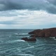 Drone shot of waves crashing against cliffs - VideoHive Item for Sale