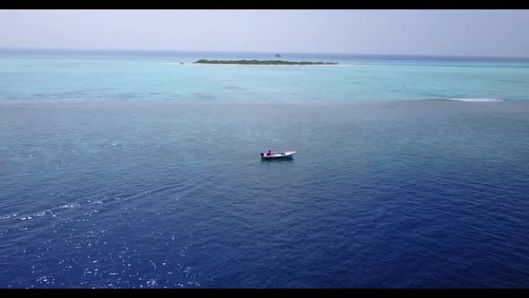 Aerial drone seascape of paradise coastline beach voyage by blue ocean and white sandy background of