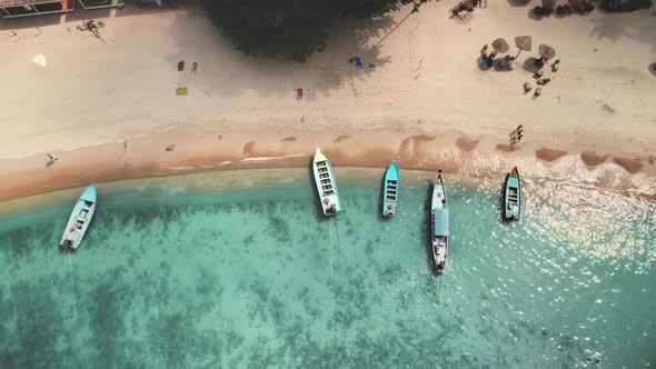 Aerial Boats on Azure Water