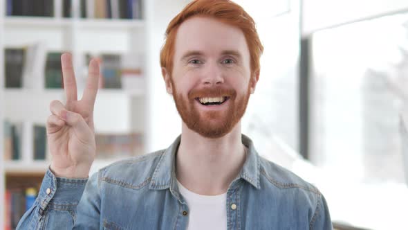 Victory Sign By Positive Casual Redhead Man