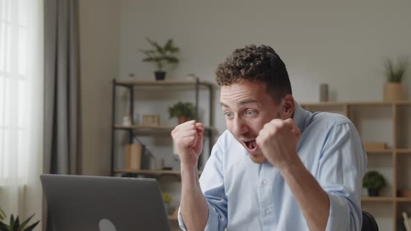 Attractive Man Celebrate Unbelievable Notice Read on Laptop