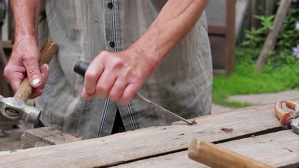 Old Man's Hands Working.