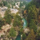 Aerial View of bridge above the Bhagirathi river surrounded by pine forest in Harshil, Uttarakhand - VideoHive Item for Sale