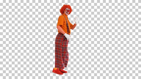 Clown in a red wig walking and greeting everyone, Alpha Channel