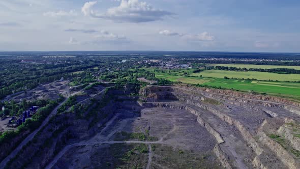 Opencast Granite Mining Quarry with Working Machinery