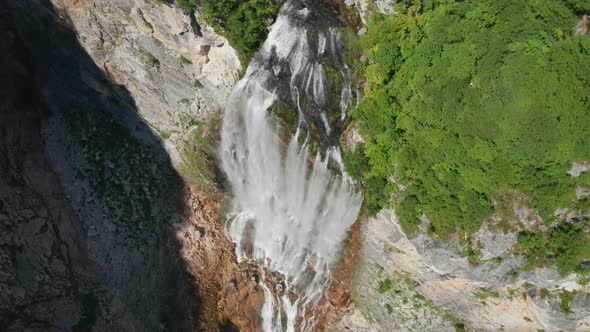 Drone Flight Over Mountain With Waterfall