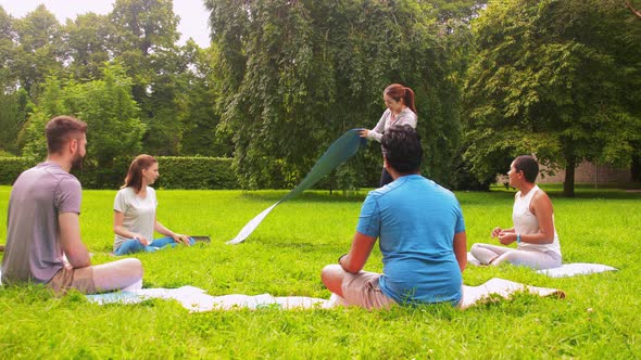 Group of People Meeting for Yoga Class at Park