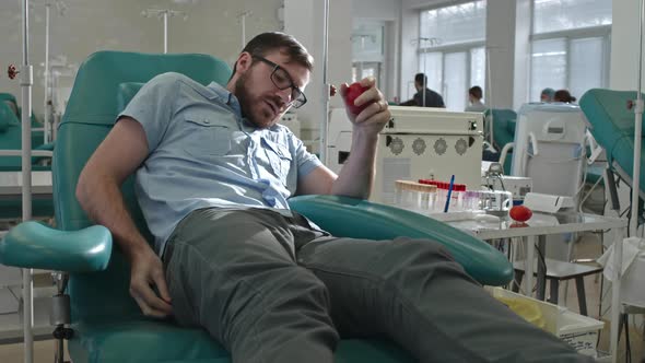 Man Preparing for Blood Transfusion