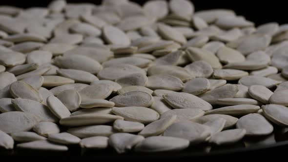 Cinematic, rotating shot of pumpking seeds - PUMPKIN SEEDS 017