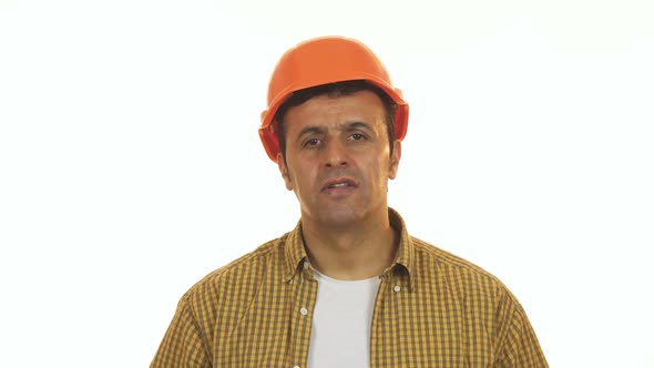 Professional Constructionist Looking Shocked Taking Off His Hardhat