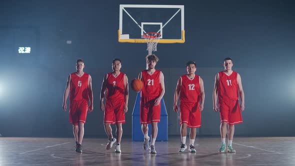 Performance Group of Basketball Players Goes Through the Playground the International Basketball