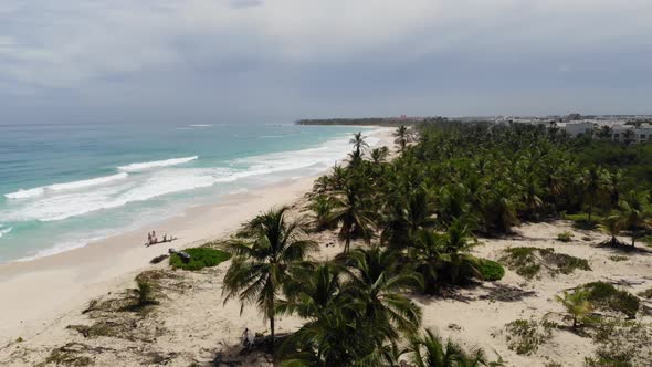 Holiday in Dominican Republic Couple is Walking on a Beautiful Beach