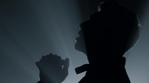 Silhouette Religious Man Asking God Blessing
