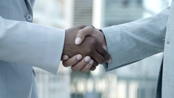 African American Businessmen Shaking Hands Outdoor