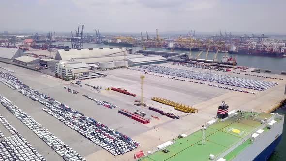 Aerial view of logistics concept roll-on/roll-off car carrier ship
