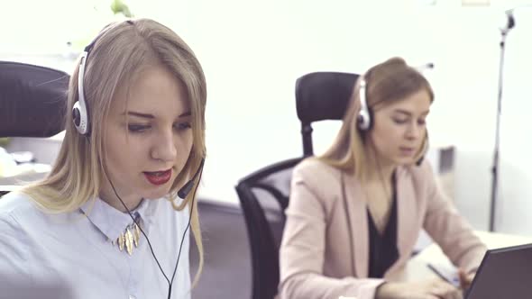 Call Center Agents Speaking with Customer