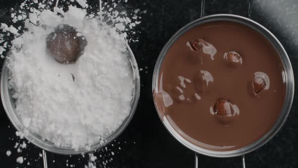 Tabletop Shot: Chef Chocolatier Drops Truffles To the Sugar Powder in Slow Motion, Confectioner