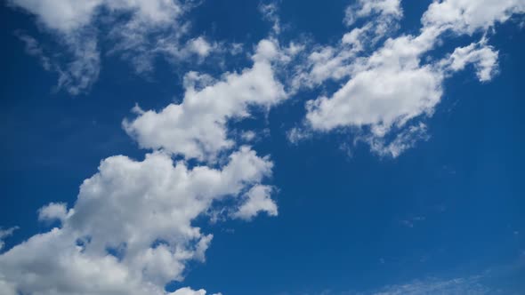 Clouds Move Smoothly in the Blue Sky. Timelapse