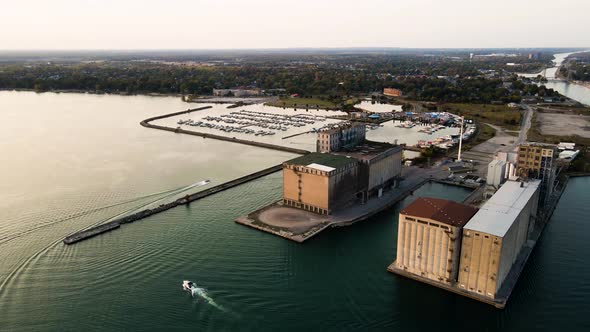 Stunning aerial view of boats arriving in the marina. Aerial view of port infrastructure in the mari