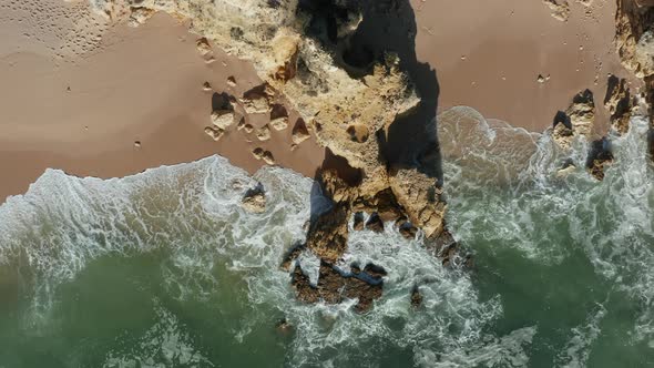 Aerial view of cliffs and the sand beach Praia da Balbina, Portugal
