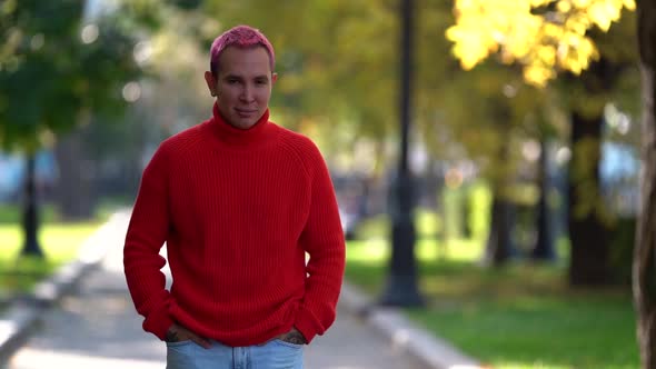 Thoughtful Lonely Gay Is Walking on City Street at Fall Day, Creative Pink Hairstyle, Lgbt Community