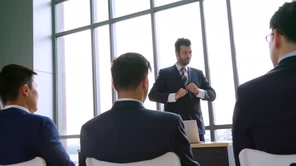 Group of Business People Meeting in a Seminar Conference