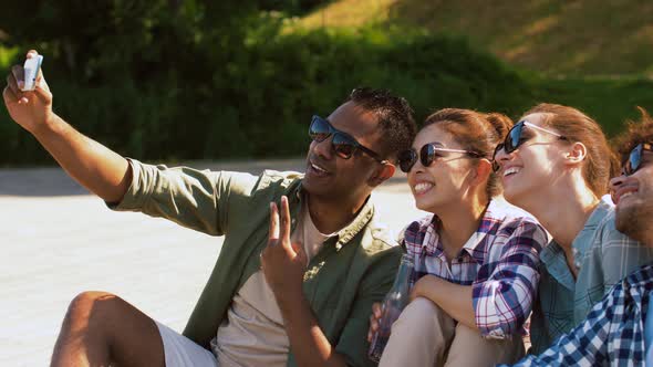 Friends with Drinks Taking Selfie By Smartphone