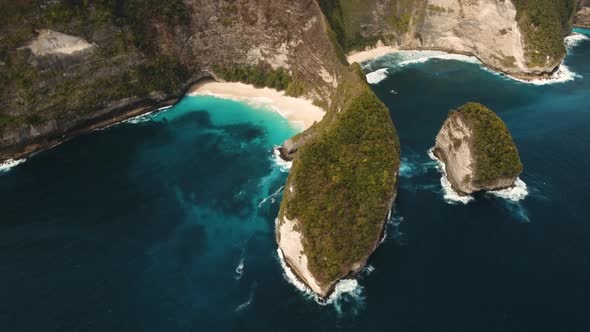 Rocky Cliff with Beach in the Sea. Karang Dawa