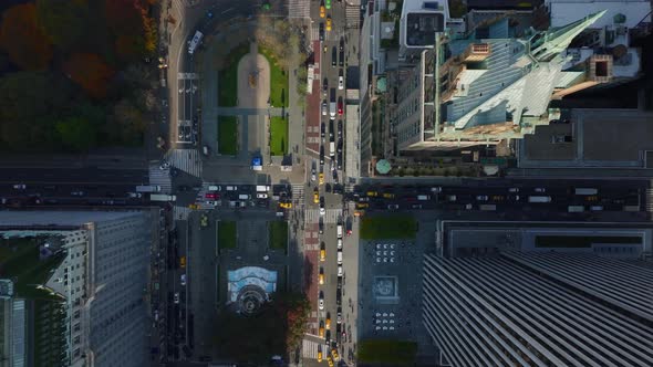 Aerial Birds Eye Overhead Top Down Descending Footage of Traffic in Streets and Crossroads Around