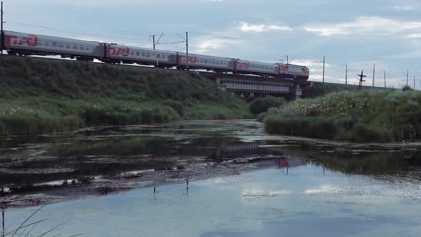 Passenger Train Passing Over the Bridge