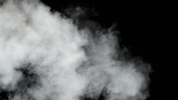 Water Vapor. Slow Motion 240Fps. Jet of Steam Under Pressure on Black Background