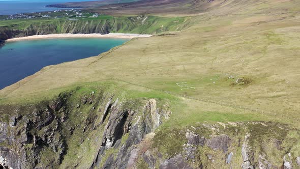 Aerial View of the Beautiful Coast at Malin Beg with Slieve League in the Background in County