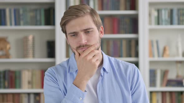 Portrait of Pensive Man Thinking and Getting Idea