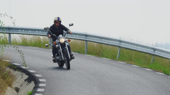 Riding a motorcycle on a curvy road