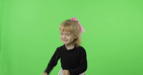 Girl in Black and White Dress Dancing. Happy Four Years Old Child. Chroma Key