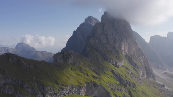 Drone Shot of Seceda's Sizeable Mountain Peak with a Clear View of the Sky