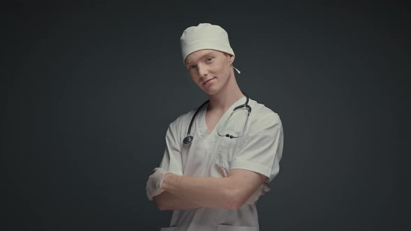 Young Doctor In White Hat