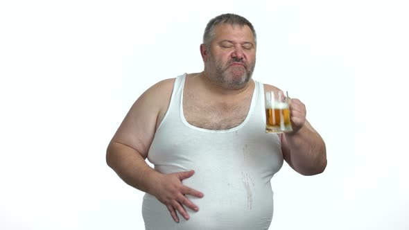 Happy Man Drinking Beer on White Background