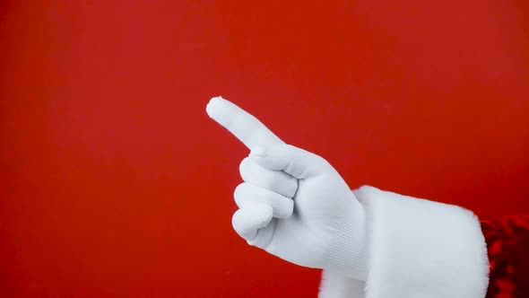 Photo Santa Claus Gloved Hands Pointing Gesture