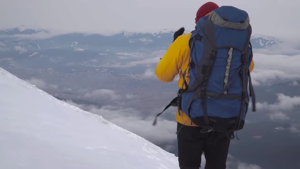 Traveller in the Mountains in Winter