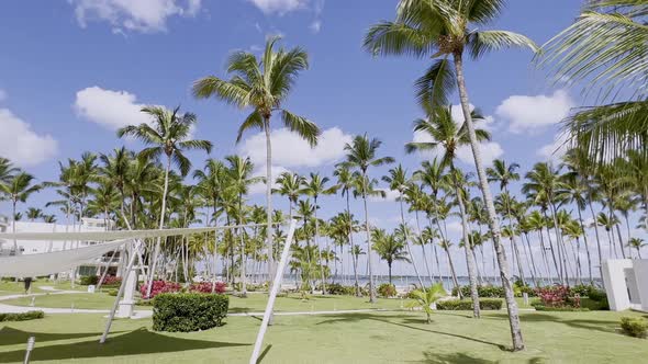 First-person view walking in La Ensenada resort garden, Playa Nueva Romana. Dominican Republic